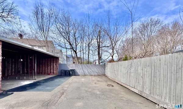 a view of a house with a snow in yard