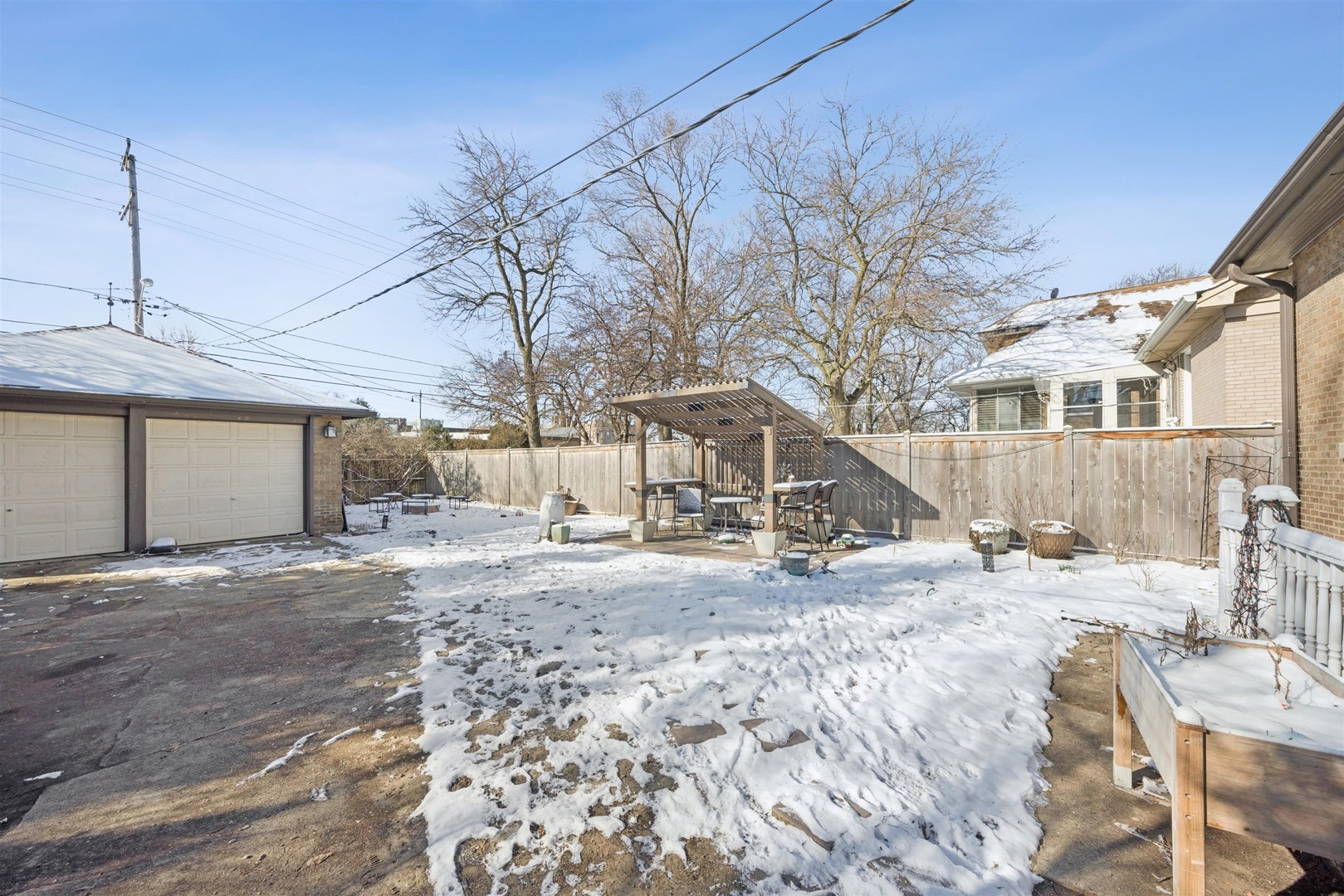 1120 Dobson Street Evanston, IL 60202 - Photo 17 of 21 a view of a house with snow on the road