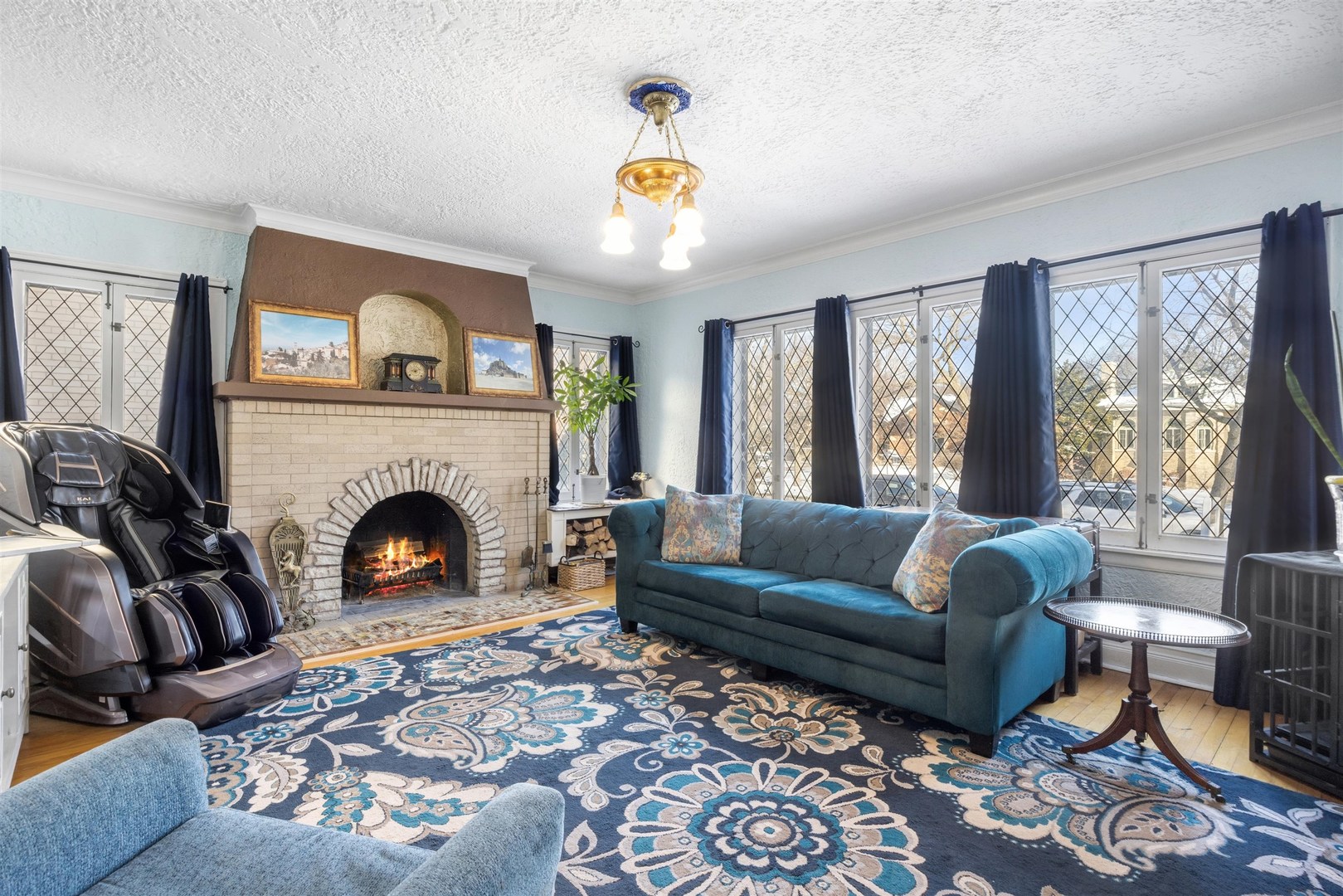 1120 Dobson Street Evanston, IL 60202 - Photo 2 of 21 a living room with furniture and a fireplace