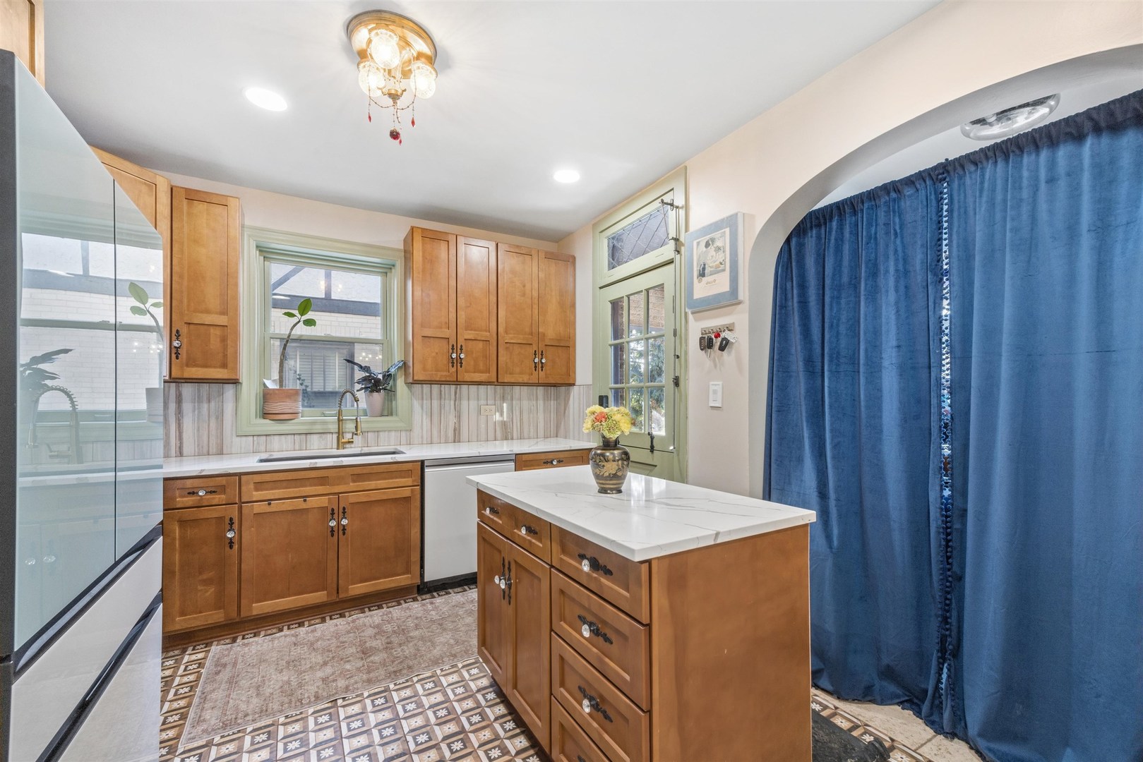 1120 Dobson Street Evanston, IL 60202 - Photo 5 of 21 a kitchen with a sink and cabinets
