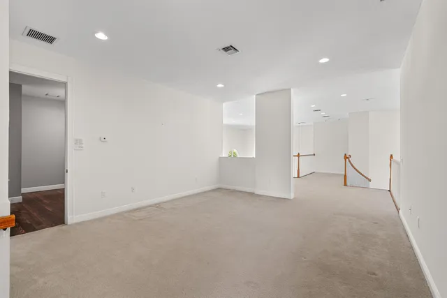 a view of a swimming pool with a yard