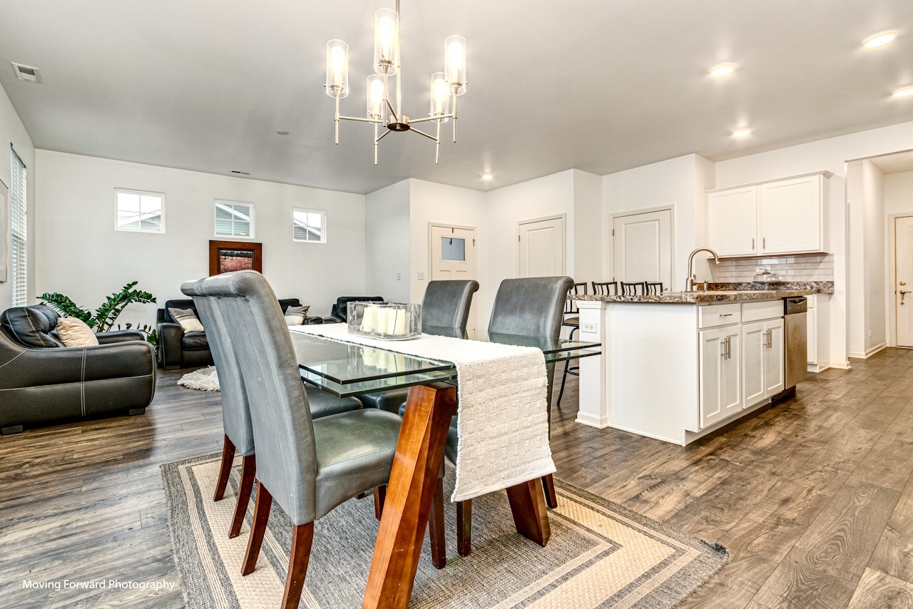 1908 Southern Circle, Unit 1908 Pingree Grove, IL 60140 - Photo 11 of 30 a view of kitchen with cabinets and wooden floor