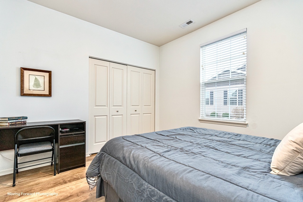 1908 Southern Circle, Unit 1908 Pingree Grove, IL 60140 - Photo 17 of 30 a bedroom with a bed and a window