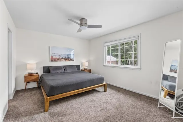 a bedroom with a bed and a cabinets