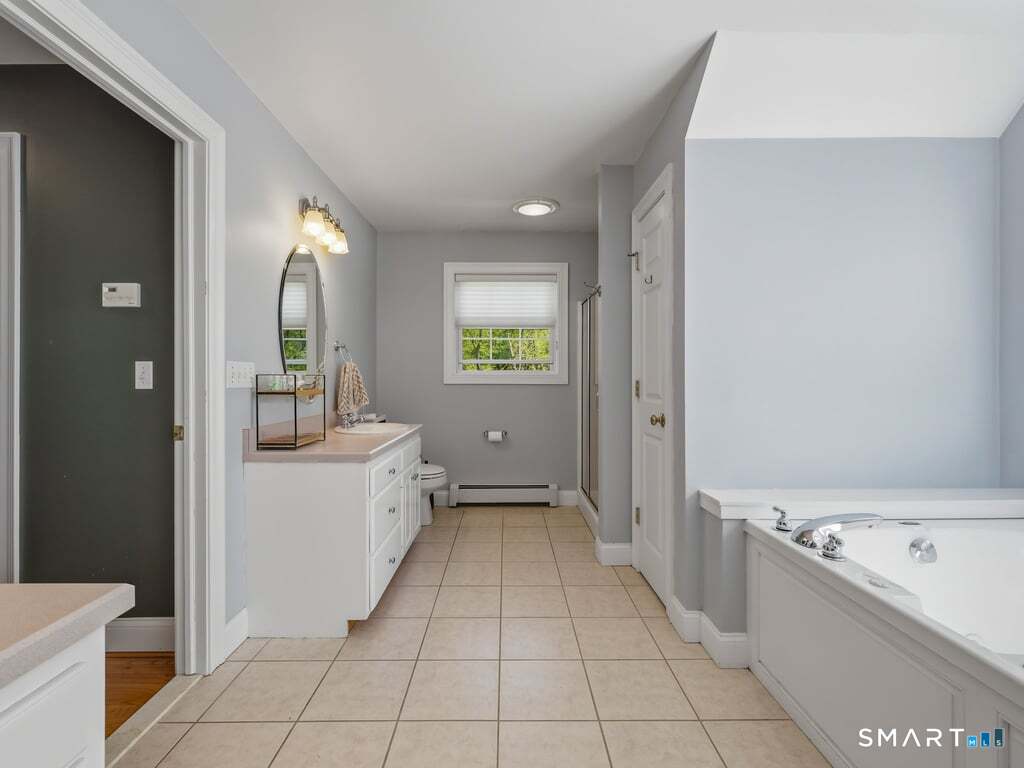 15 Fox Ridge Lane Hebron, CT 06248 - Photo 25 of 40 Primary bath! Walk in shower, jetted tub, and double vanities!