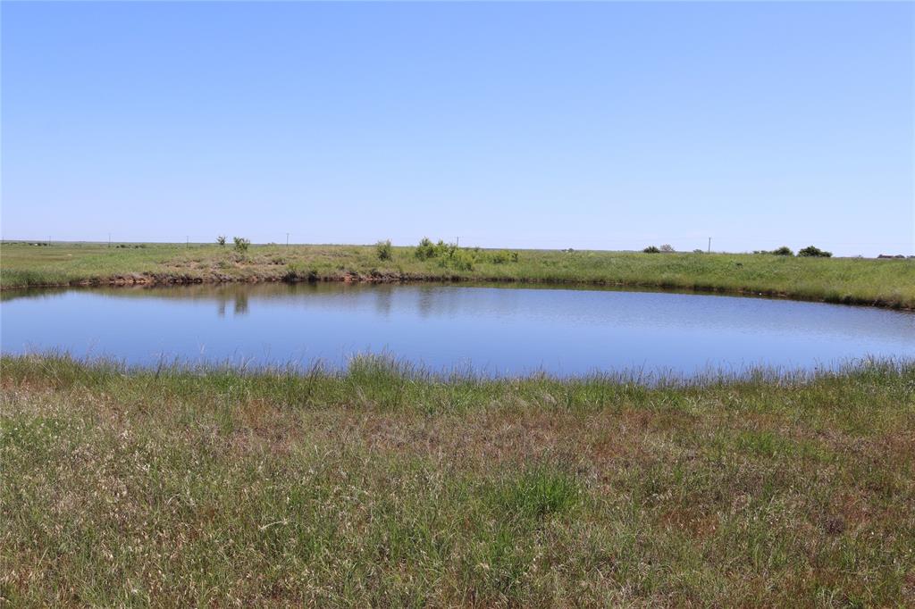 293-acres Deer Creek Road Henrietta, TX 76365 - Photo 16 of 22 a view of a lake with a city