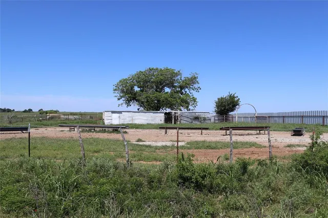 a view of lake with green space