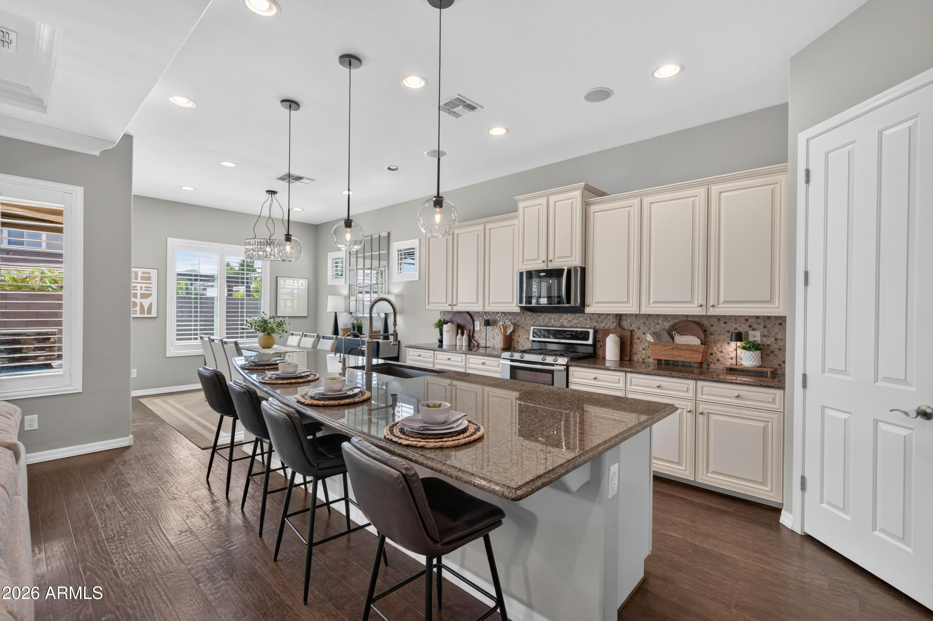 2883 East Ridgewood Lane Gilbert, AZ 85298 - Photo 17 of 77 12’ Granite Island w/Breakfast Bar