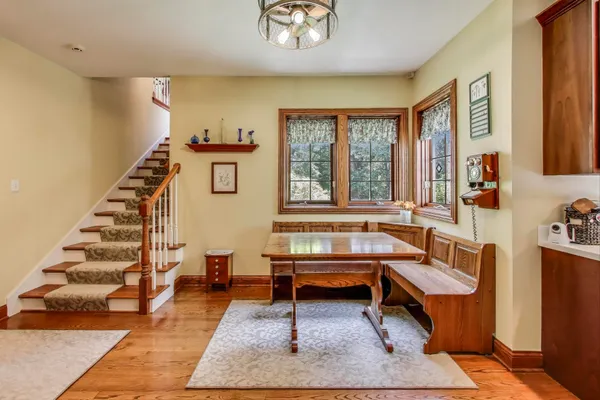 a view of a porch with wooden floor