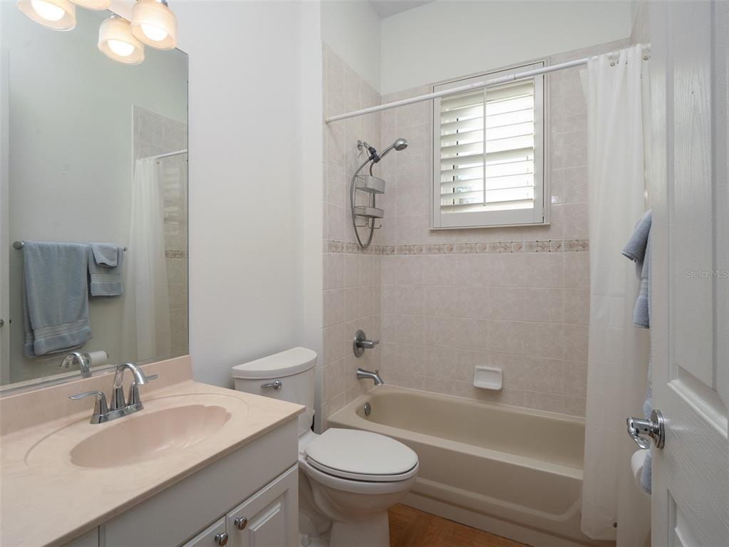2185 Northwest 114th Loop Ocala, FL 34475 - Photo 14 of 25 a bathroom with a sink toilet tub and shower