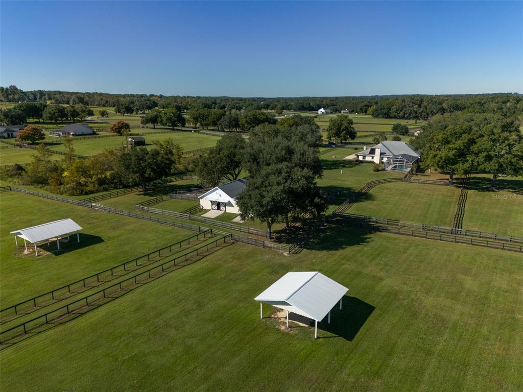 2185 Northwest 114th Loop Ocala, FL 34475 - Photo 19 of 25 an aerial view of a house with a yard