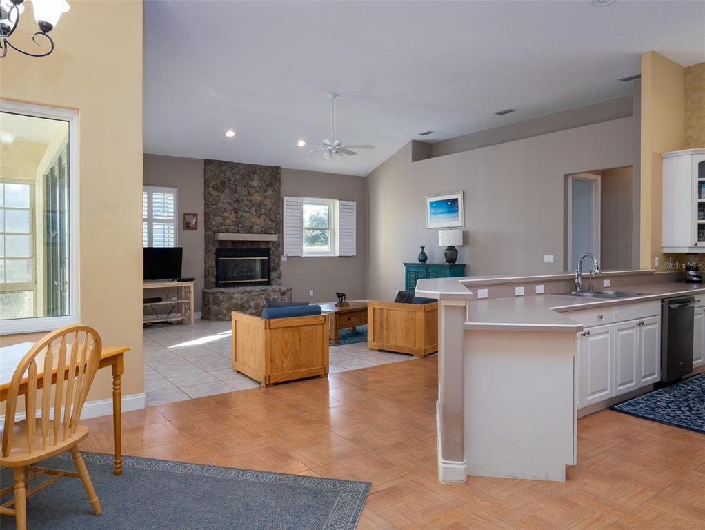 2185 Northwest 114th Loop Ocala, FL 34475 - Photo 7 of 25 a living room with granite countertop furniture and fireplace