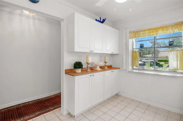 a bathroom with a granite countertop sink mirror and double