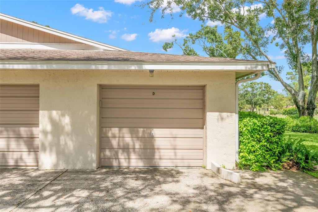 1012 Dunrobin Drive, Unit D Palm Harbor, FL 34684 - Photo 5 of 61 a view of entrance gate of a house