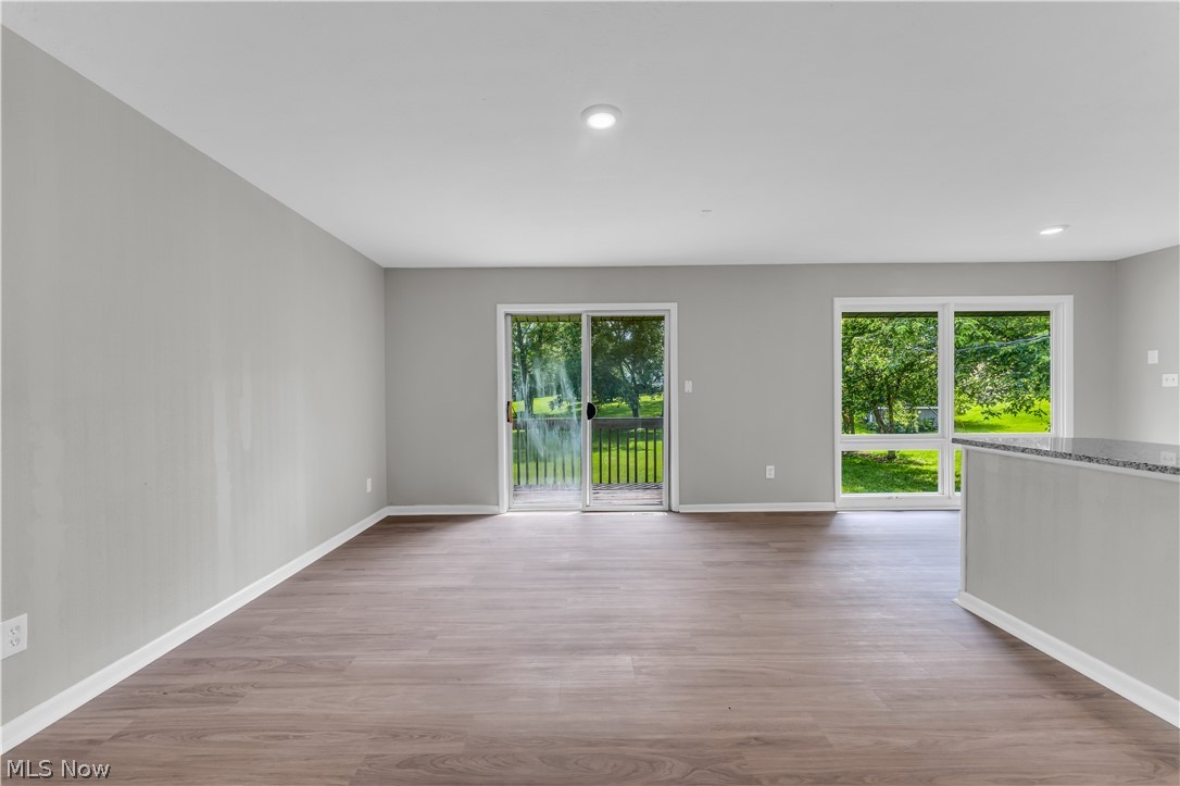 6190 Mill Road Broadview Heights, OH 44147 - Photo 8 of 36 Unfurnished room featuring hardwood / wood-style floors