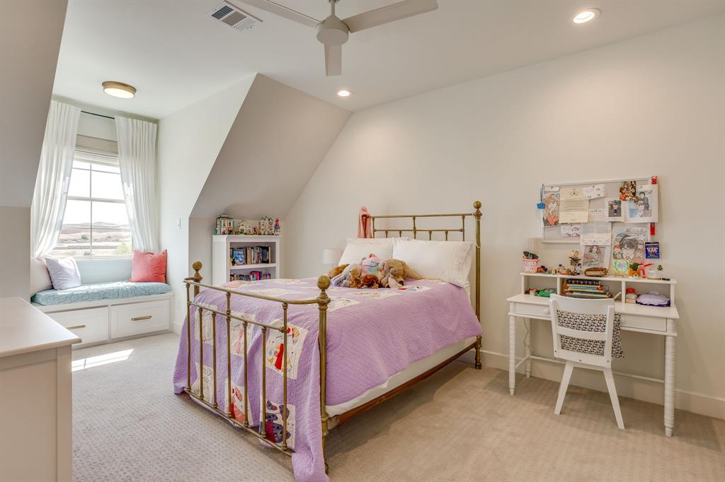 14000 Rozana Street Fort Worth, TX 76008 - Photo 29 of 38 a bedroom with a bed and a table in it