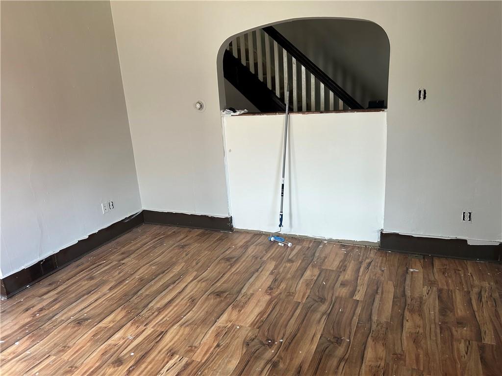 727 South 14th Street Monessen, PA 15062 - Photo 7 of 13 a view of staircase with wooden floor