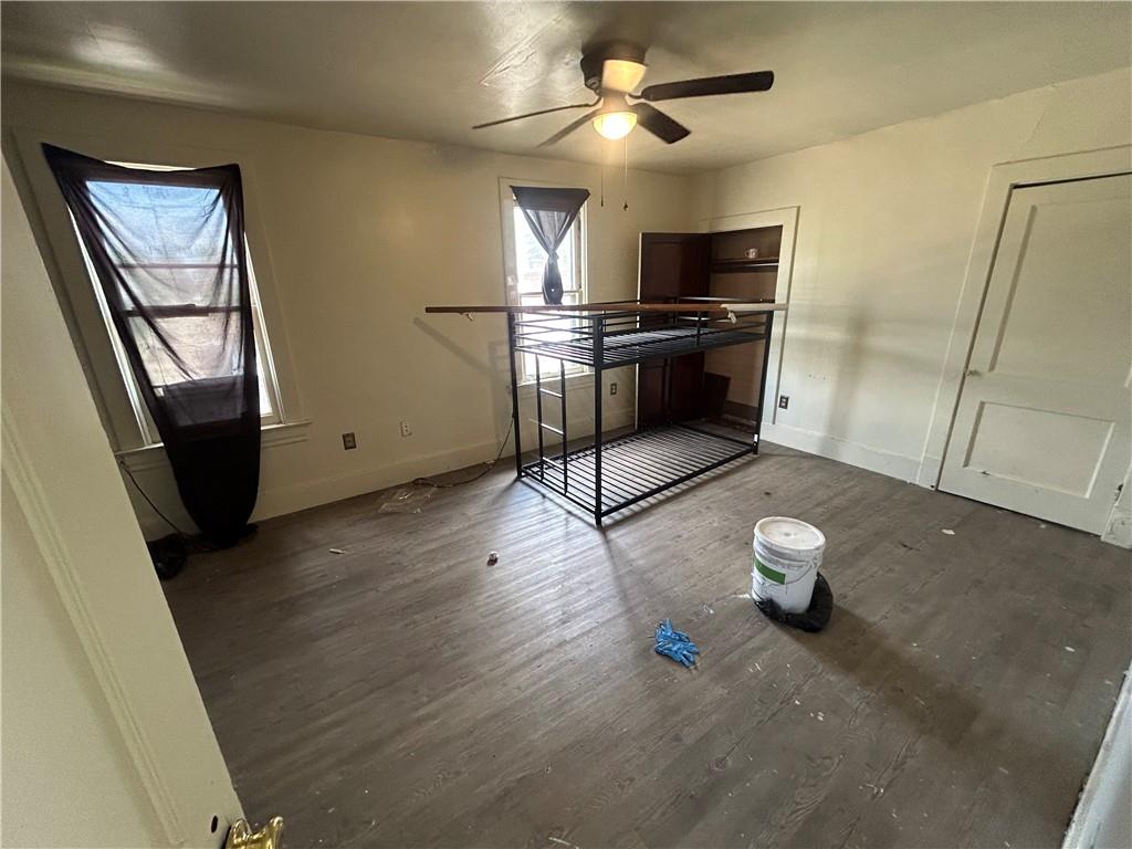 727 South 14th Street Monessen, PA 15062 - Photo 9 of 13 a view of a hardwood floor and an empty room