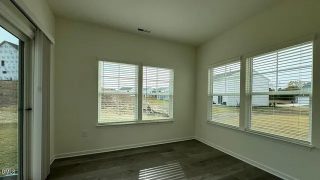 a kitchen with stainless steel appliances granite countertop a sink stove and microwave