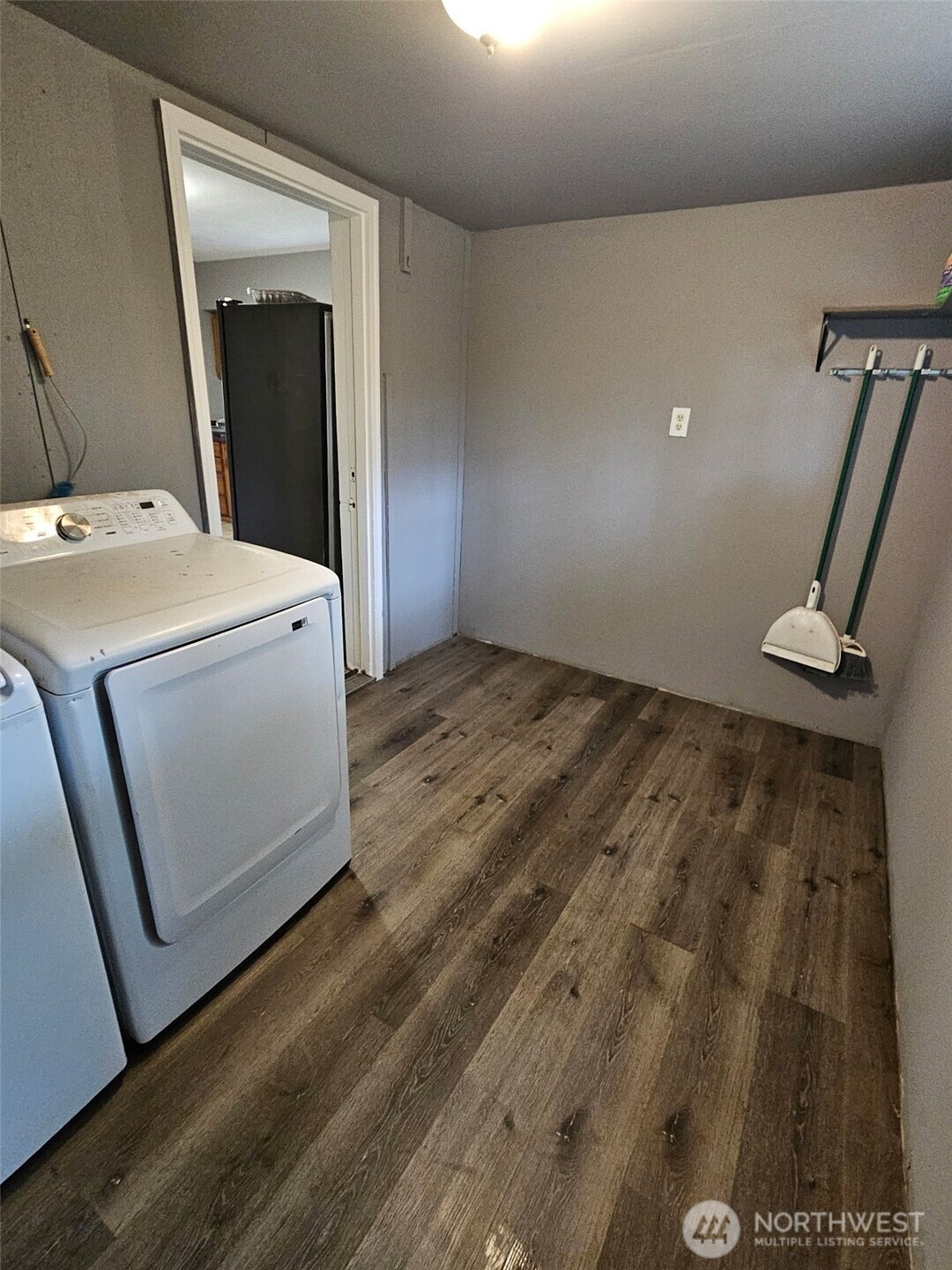 906 Southwest Mayer Street Winlock, WA 98596 - Photo 13 of 16 a view of a hallway with washer and dryer