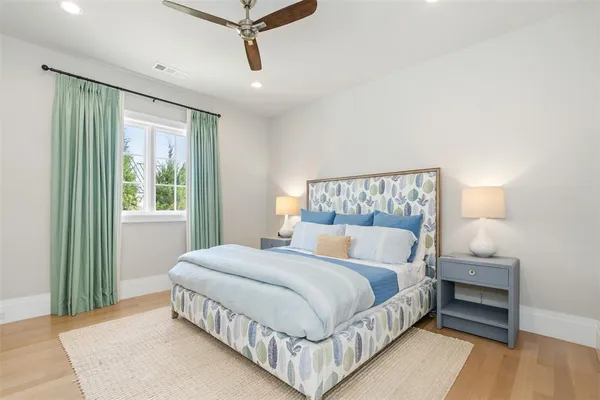 a large room with a bed and a couch