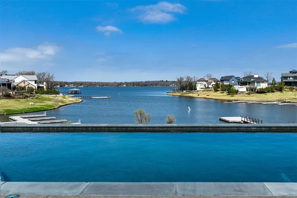 a view of swimming pool with outdoor seating