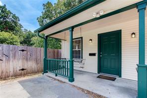 Doorway to property with covered porch