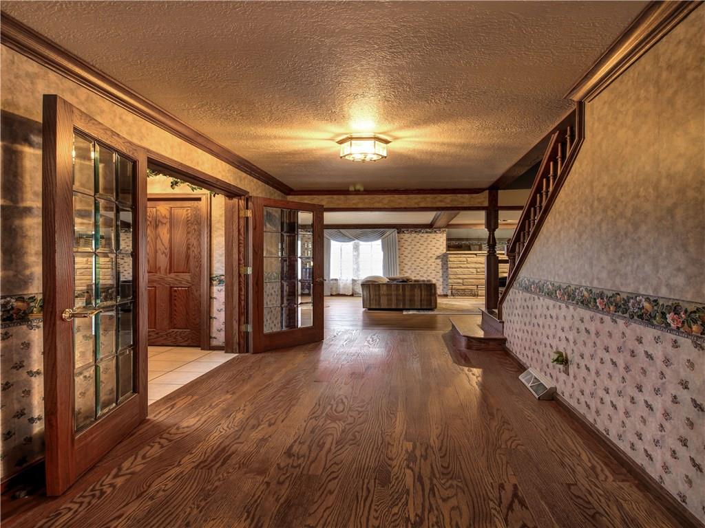 An entry Hall greets family and guests with warmth and creates the perfect traffic pattern.  