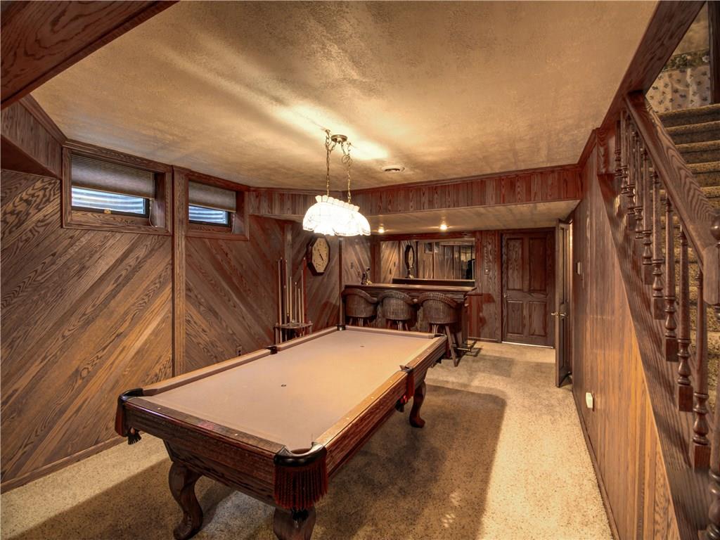 185 Thompson Road Beaver Falls, PA 15010 - Photo 20 of 25 Family Room includes wet bar, sink and refrigerator.