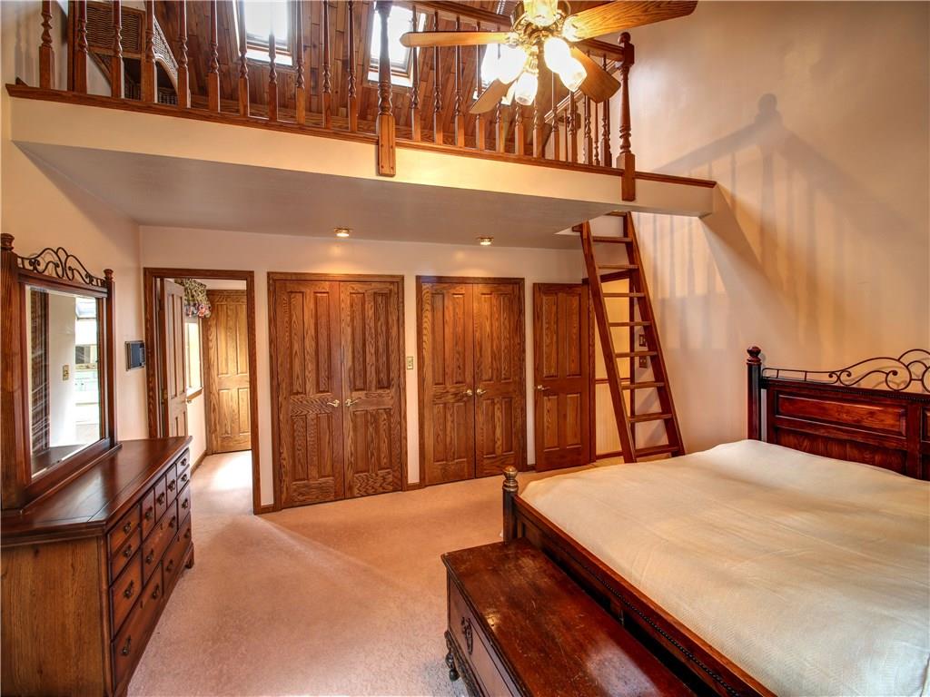 Luxurious Master Bedroom Adjoined by Bath and Dressing Room.