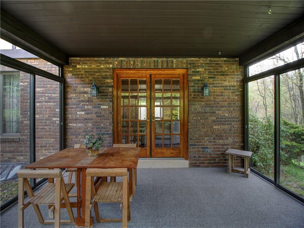 185 Thompson Road Beaver Falls, PA 15010 - Photo 23 of 25 Enclosed Patio is Lighted, Glassed and Screened and is great for entertaining. It 's easily accessible from both Dining and Living Rooms.