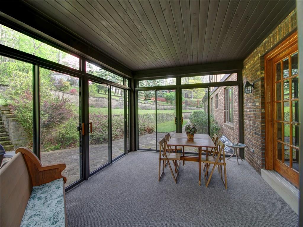 Screened and Glass Patio lets sun and breeze in. Keeps pests out!