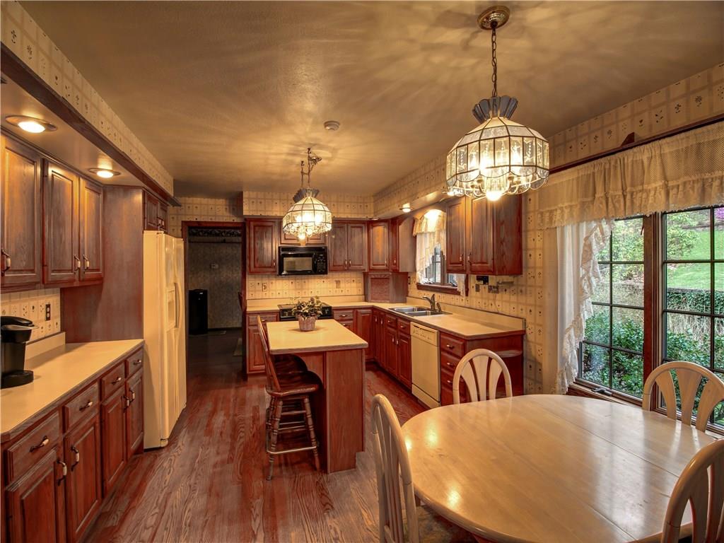 185 Thompson Road Beaver Falls, PA 15010 - Photo 8 of 25 Over sized kitchen, lots of counters and cabinets, island and large windows.
