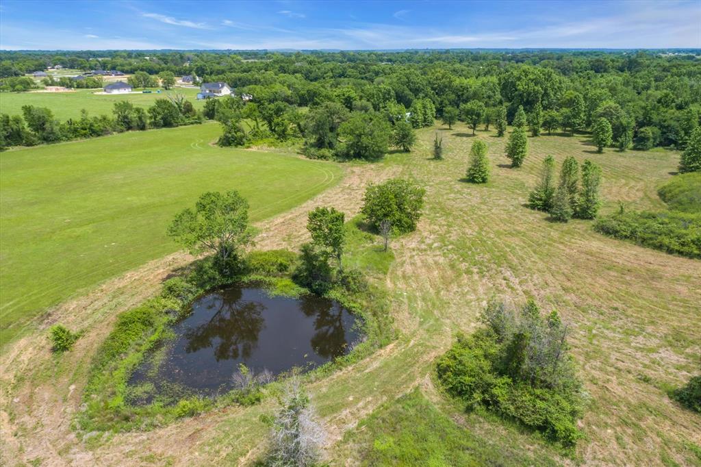 0 County Road 4106 Canton, TX 75103 - Photo 11 of 13 a view of a lake with a yard