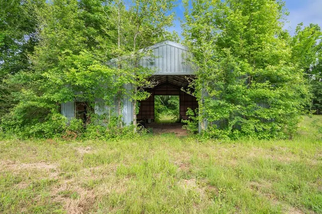 a view of a lake with a big yard