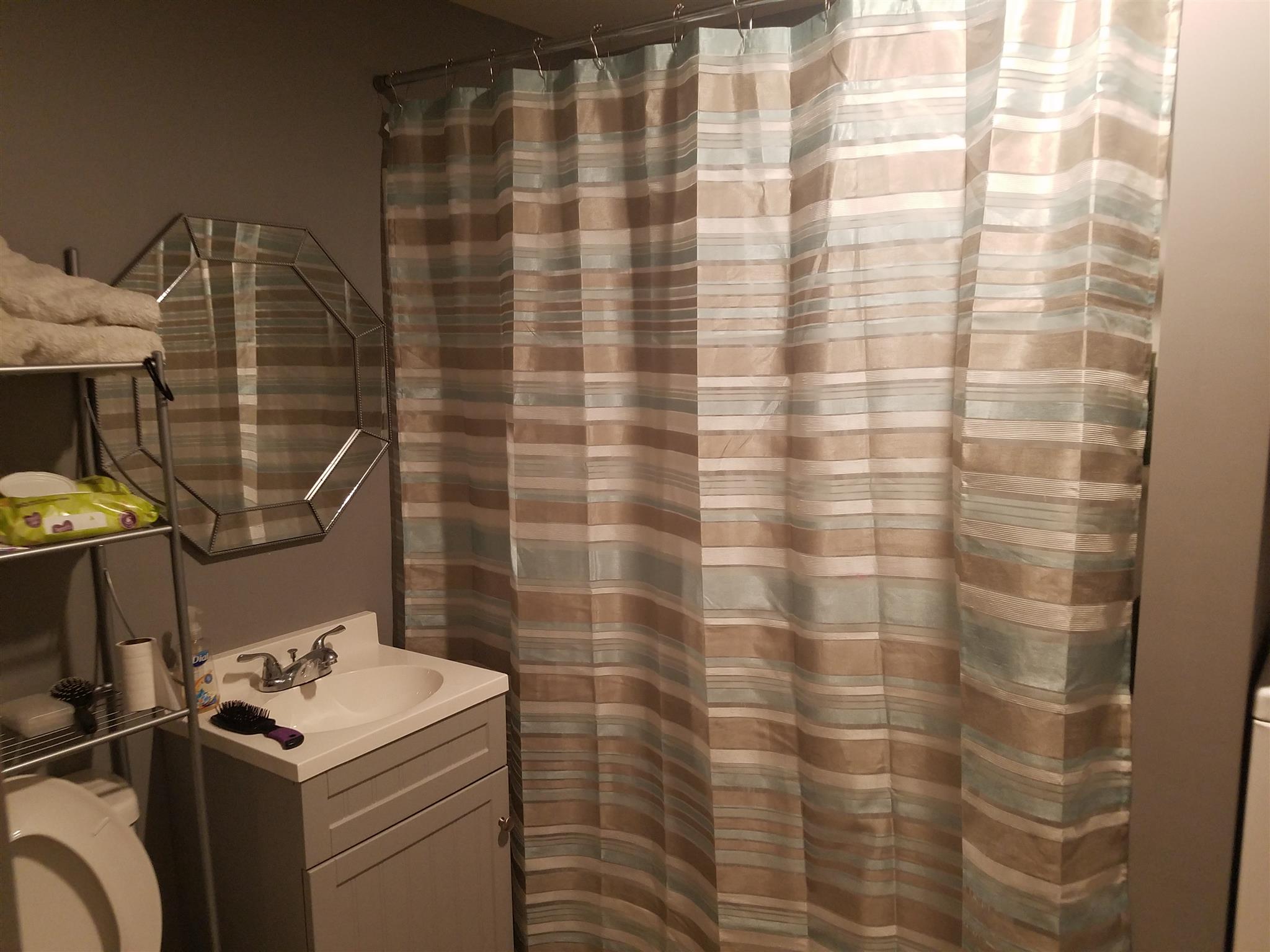 319 Manzano Road Madison, TN 37115 - Photo 11 of 12 New bath...Toilet, Sink and Vanity, Tub/shower insert, Exhaust Fan and Light, Laundry hookups, walls and Tiled floor