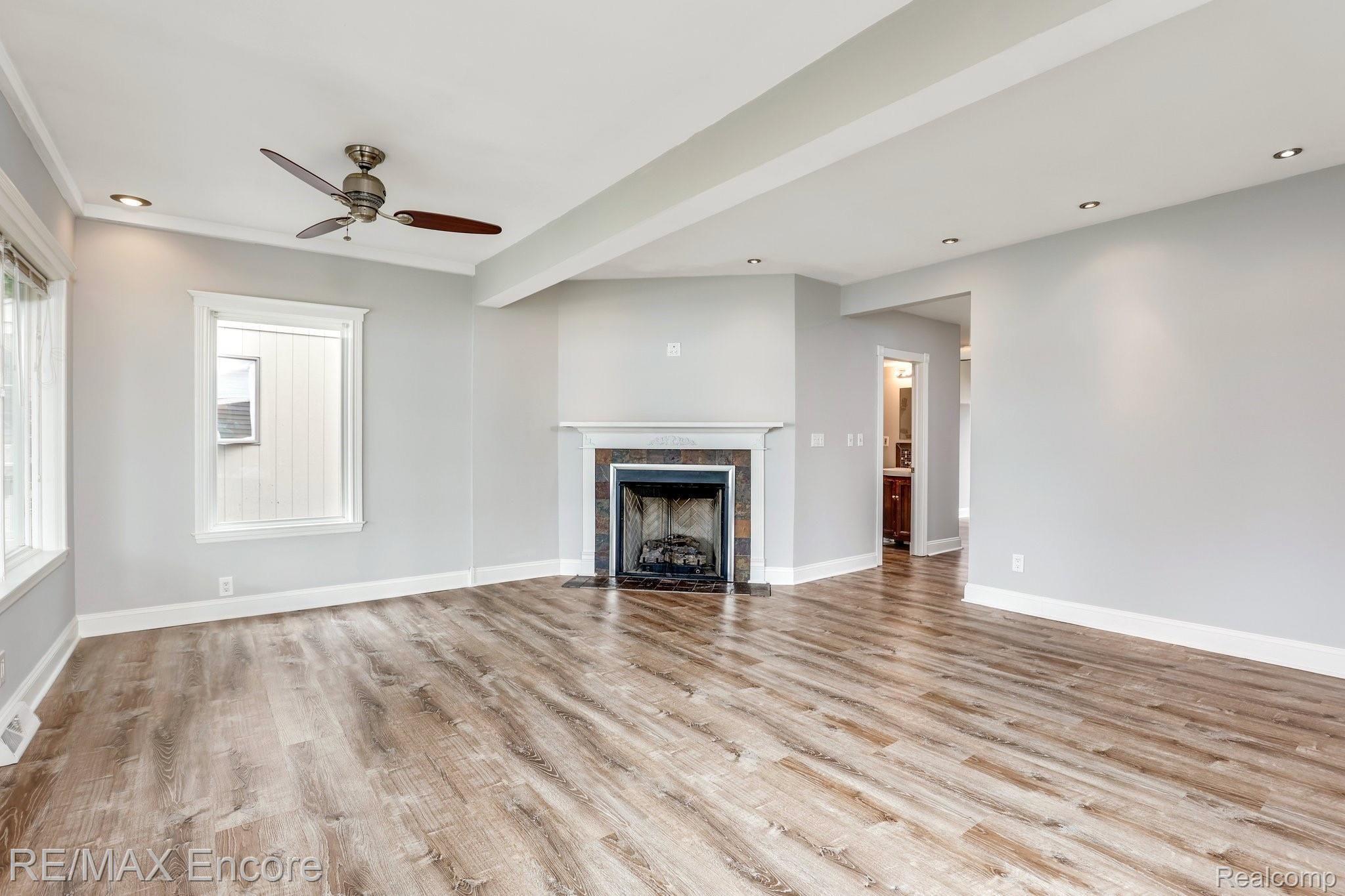 7238 Andersonville Road Clarkston, MI 48346 - Photo 11 of 33 Spacious Living with Gas Fireplace