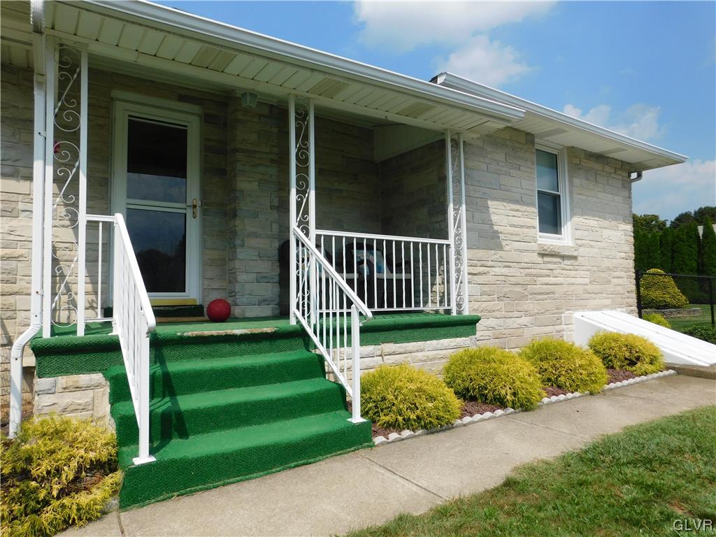 103 Fairview Avenue Wind Gap, PA 18091 - Photo 16 of 22 a front view of a house with a yard