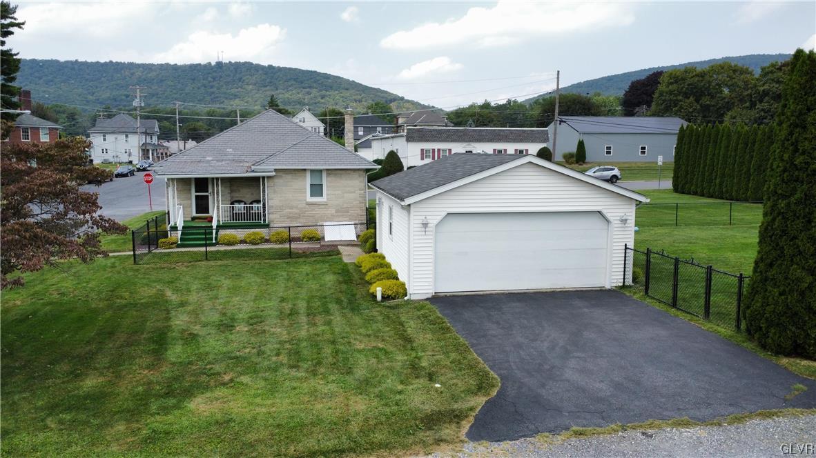 103 Fairview Avenue Wind Gap, PA 18091 - Photo 18 of 22 a front view of a house with garden