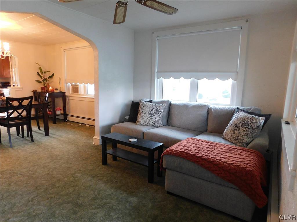 103 Fairview Avenue Wind Gap, PA 18091 - Photo 2 of 22 a living room with furniture and a large window