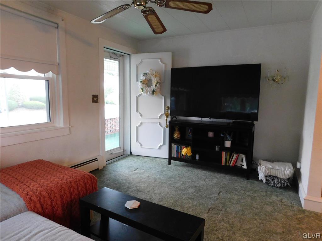 103 Fairview Avenue Wind Gap, PA 18091 - Photo 3 of 22 a living room with furniture and a flat screen tv