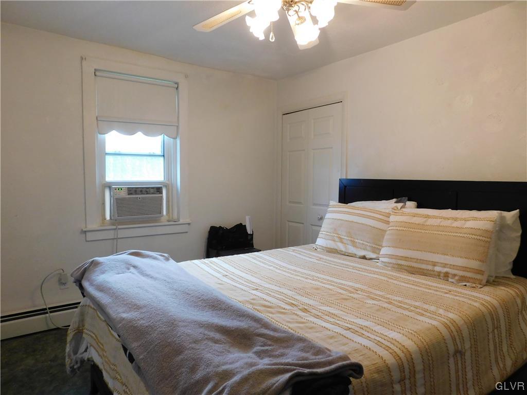 103 Fairview Avenue Wind Gap, PA 18091 - Photo 9 of 22 a bedroom with a bed and a window