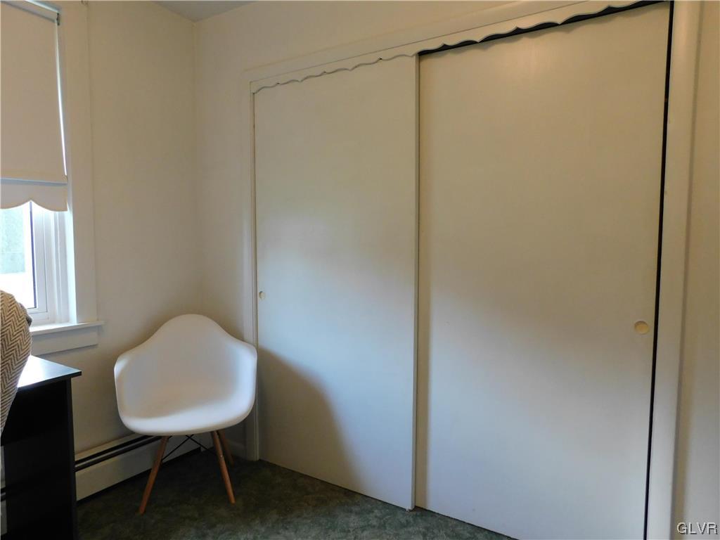 103 Fairview Avenue Wind Gap, PA 18091 - Photo 10 of 22 a bathroom with a toilet and a chair