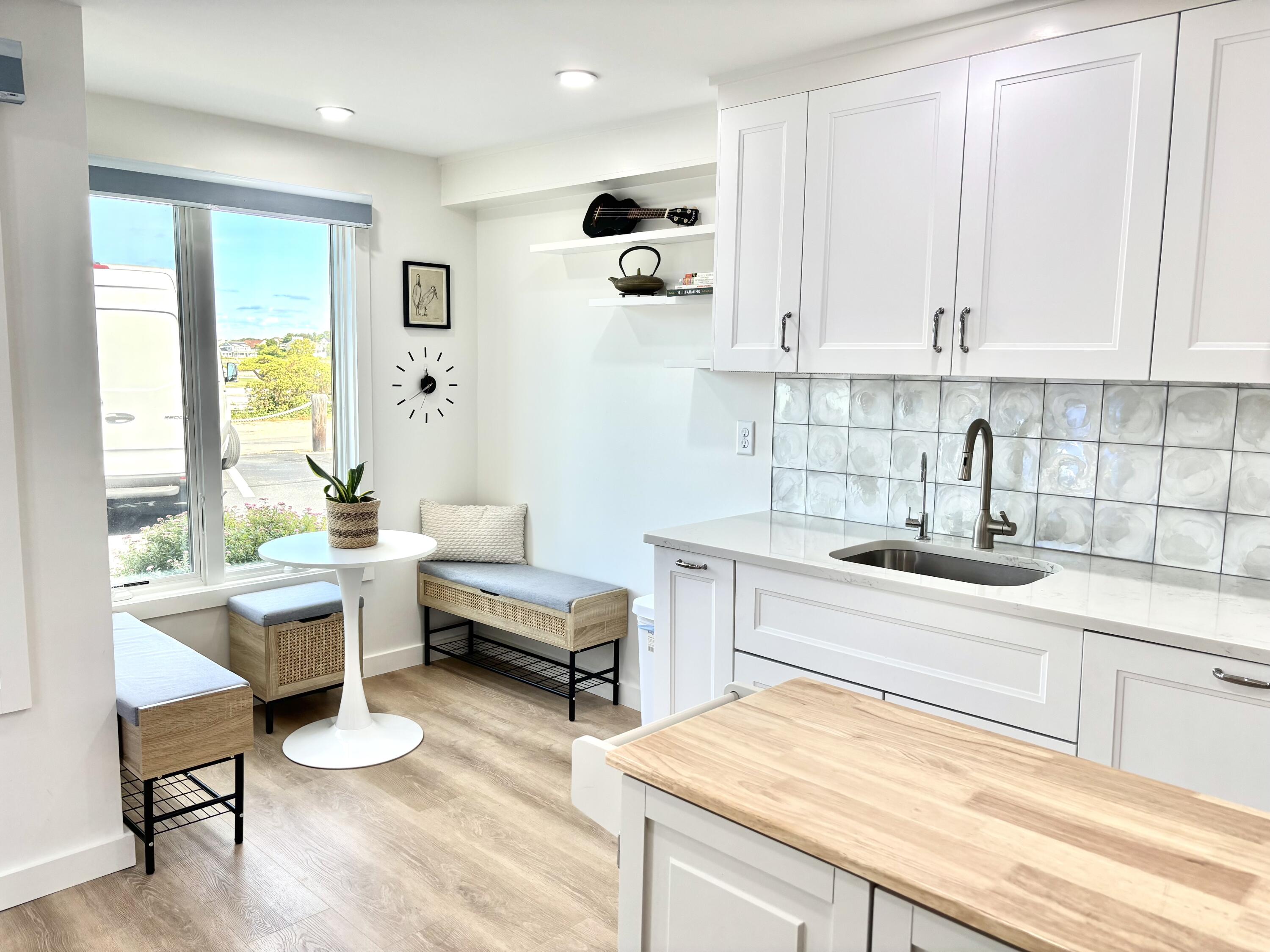 500 Ocean Street, Unit 147 Hyannis, MA 02601 - Photo 5 of 23 a kitchen with a sink cabinets and wooden floor
