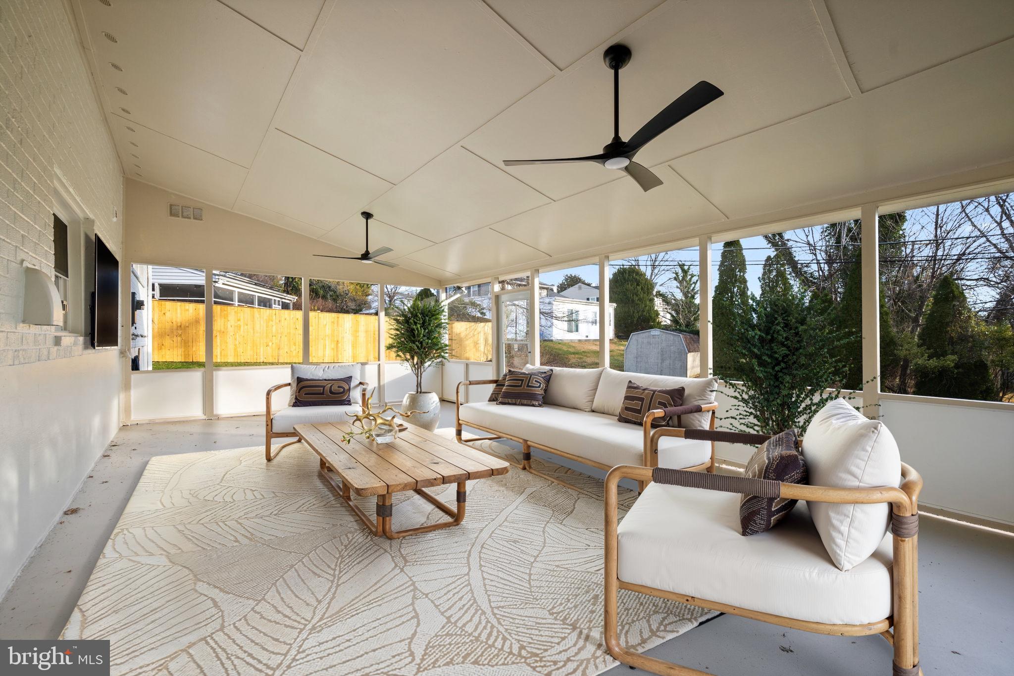 2111 Eastridge Road Lutherville-Timonium, MD 21093 - Photo 12 of 45 a living room with furniture and a large window