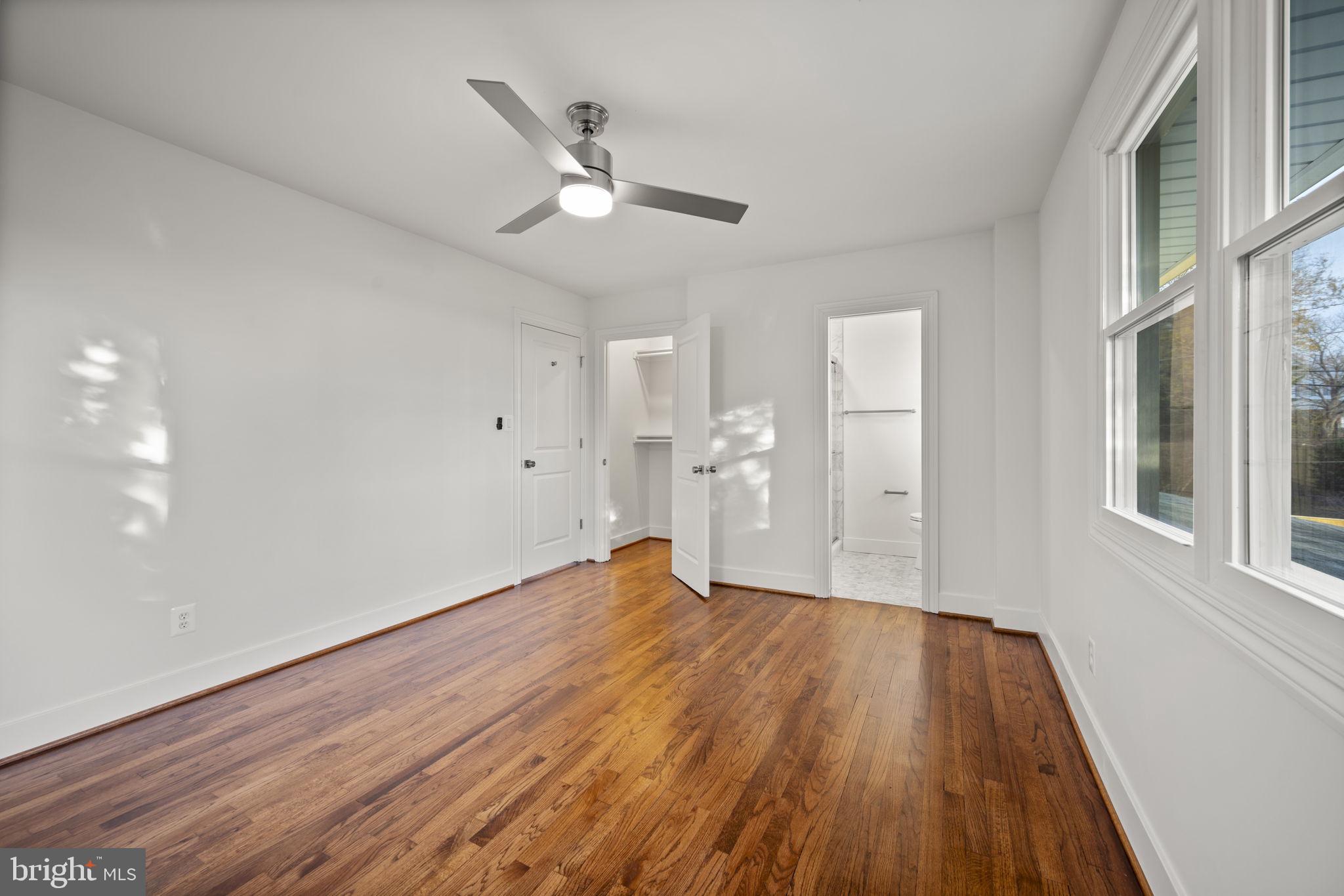 2111 Eastridge Road Lutherville-Timonium, MD 21093 - Photo 22 of 45 a view of empty room with wooden floor and fan