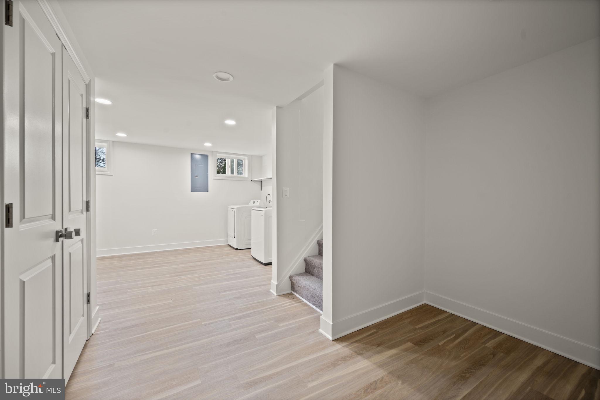 2111 Eastridge Road Lutherville-Timonium, MD 21093 - Photo 28 of 45 a view of a hallway with wooden floor