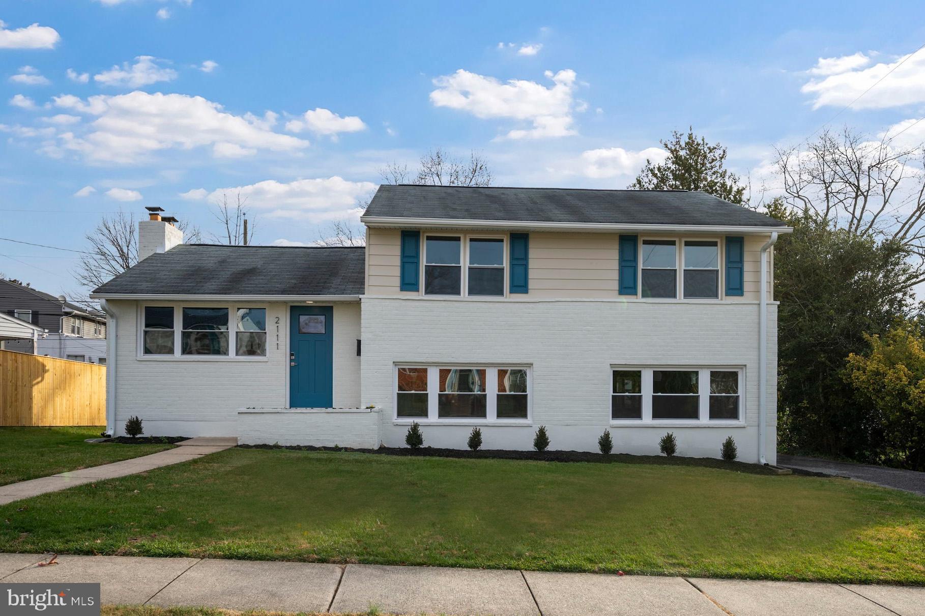 2111 Eastridge Road Lutherville-Timonium, MD 21093 - Photo 35 of 45 a front view of a house with a yard