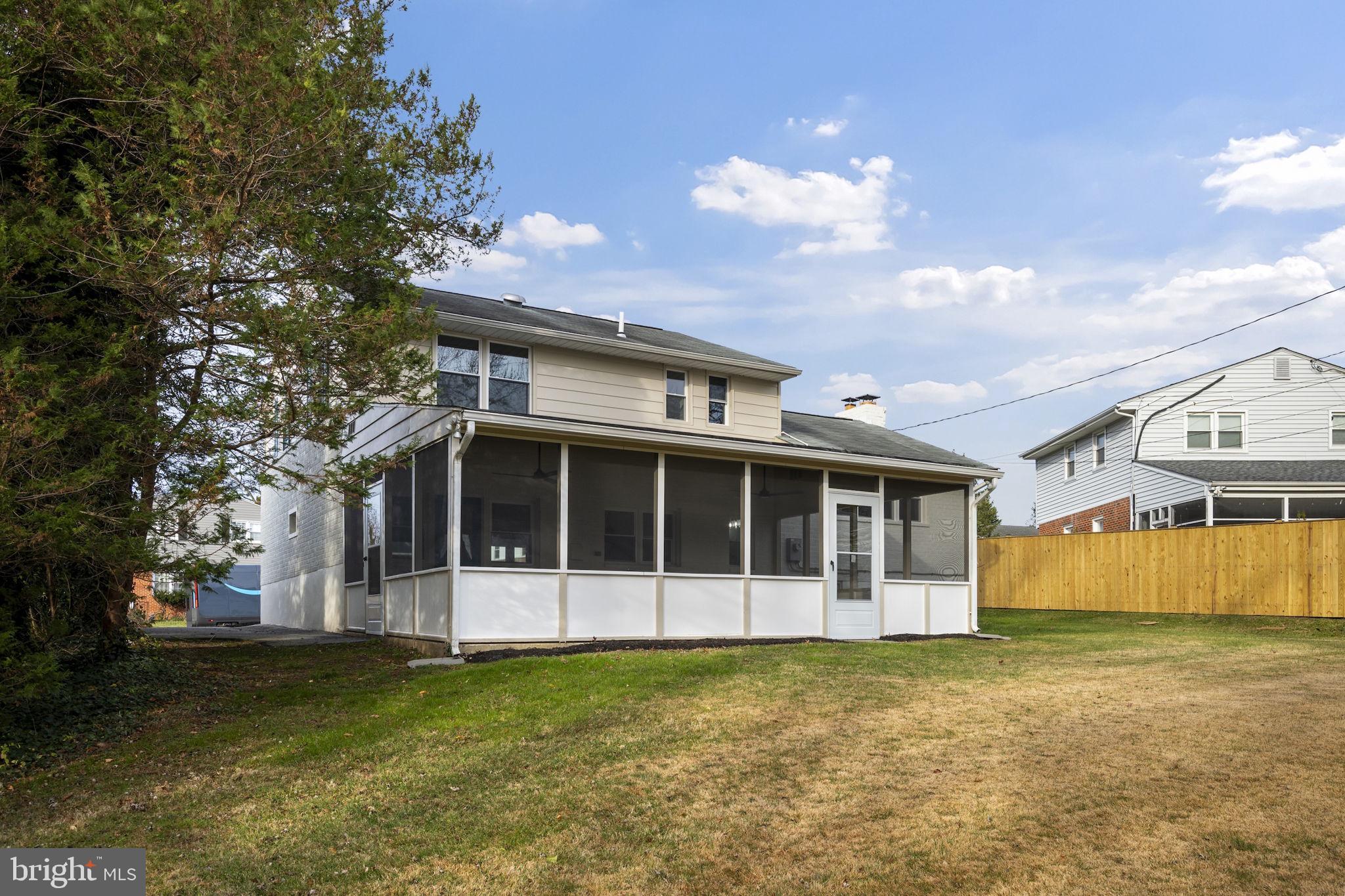 2111 Eastridge Road Lutherville-Timonium, MD 21093 - Photo 37 of 45 a view of a large building with a large trees