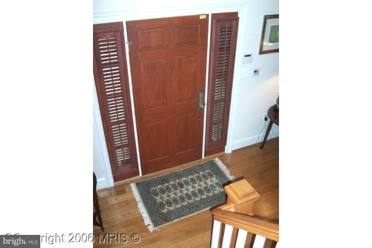 4416 Ridge Street Chevy Chase, MD 20815 - Photo 2 of 20 a picture of a bench in front of a door